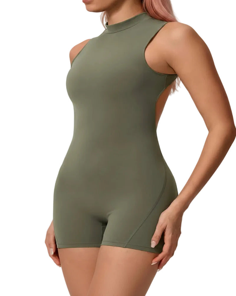 Green bodysuit worn by a model on a plain background
